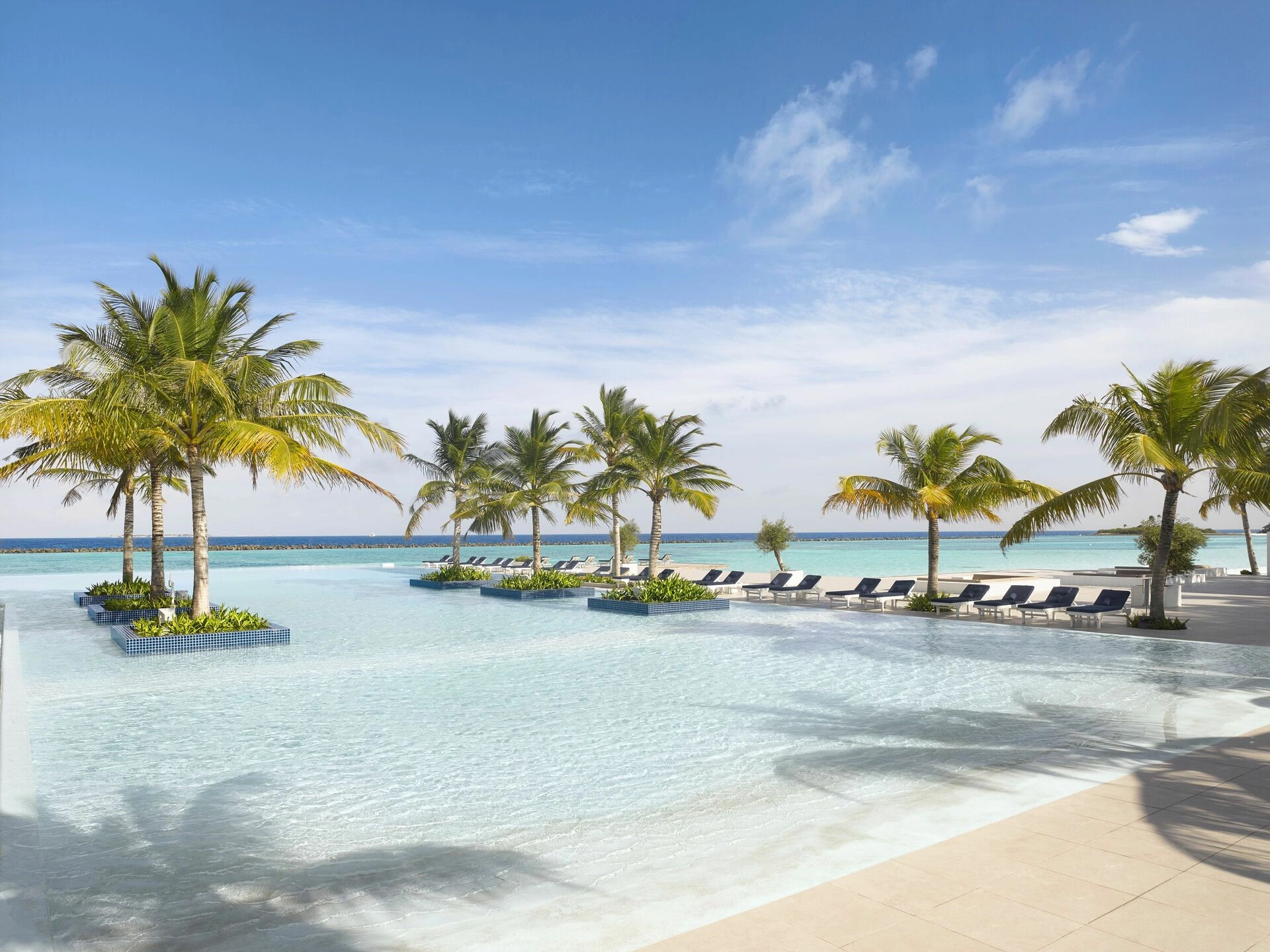 Villa_Nautica_-_Main_Pool_-_Daytime_-_4K.jpg